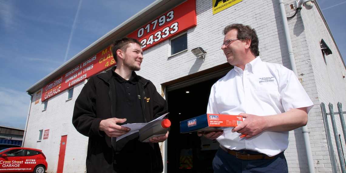 Car &amp; Truck staff members serving customer